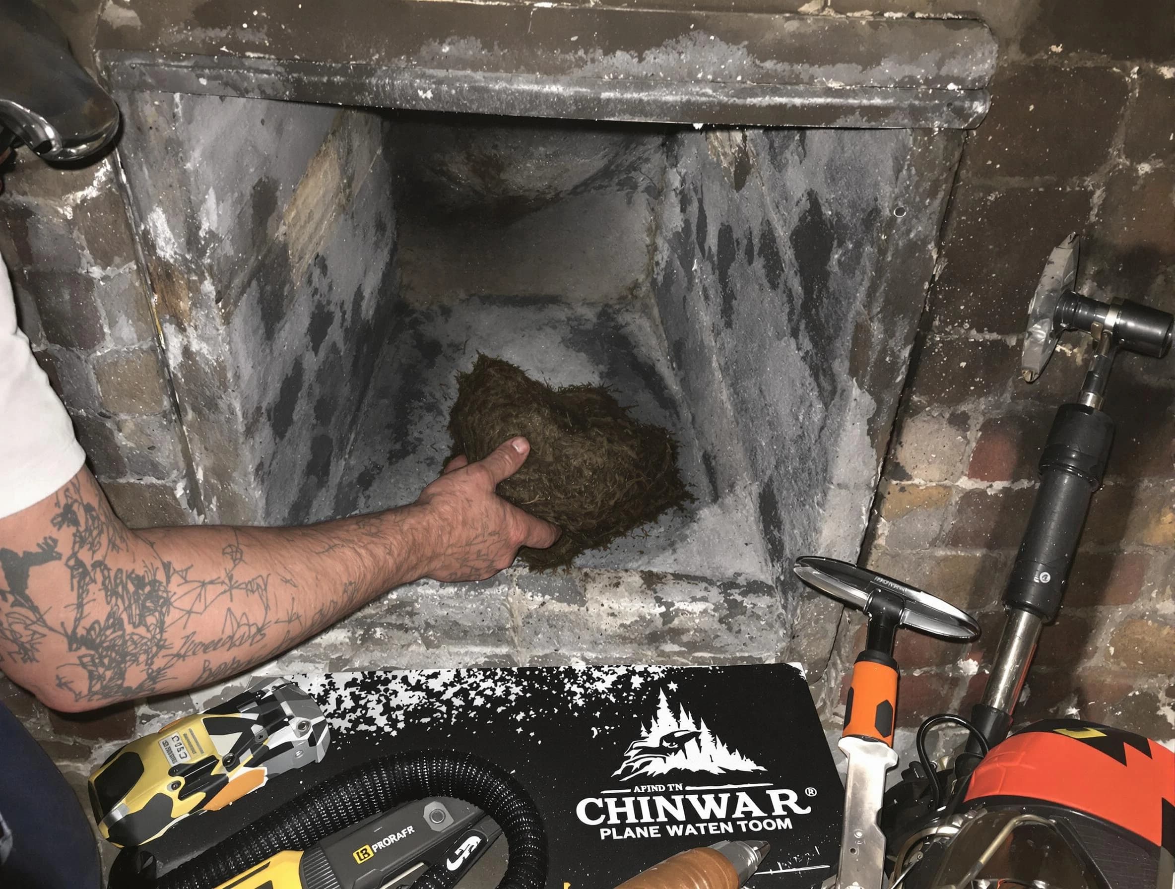 Rio Rancho Chimney Sweep safely removing debris and screening chimney in Rio Rancho, NM
